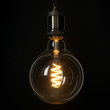 GloboStar® 99137 Λάμπα LED  Soft S Spiral Filament E27 G125 Γλόμπος 4W 300lm 360° AC 220-240V IP20 Φ12.5 x Υ18cm Θερμό Λευκό 2700K με Διάφανο Γυαλί Dimmable - 3 Χρόνια Εγγύηση